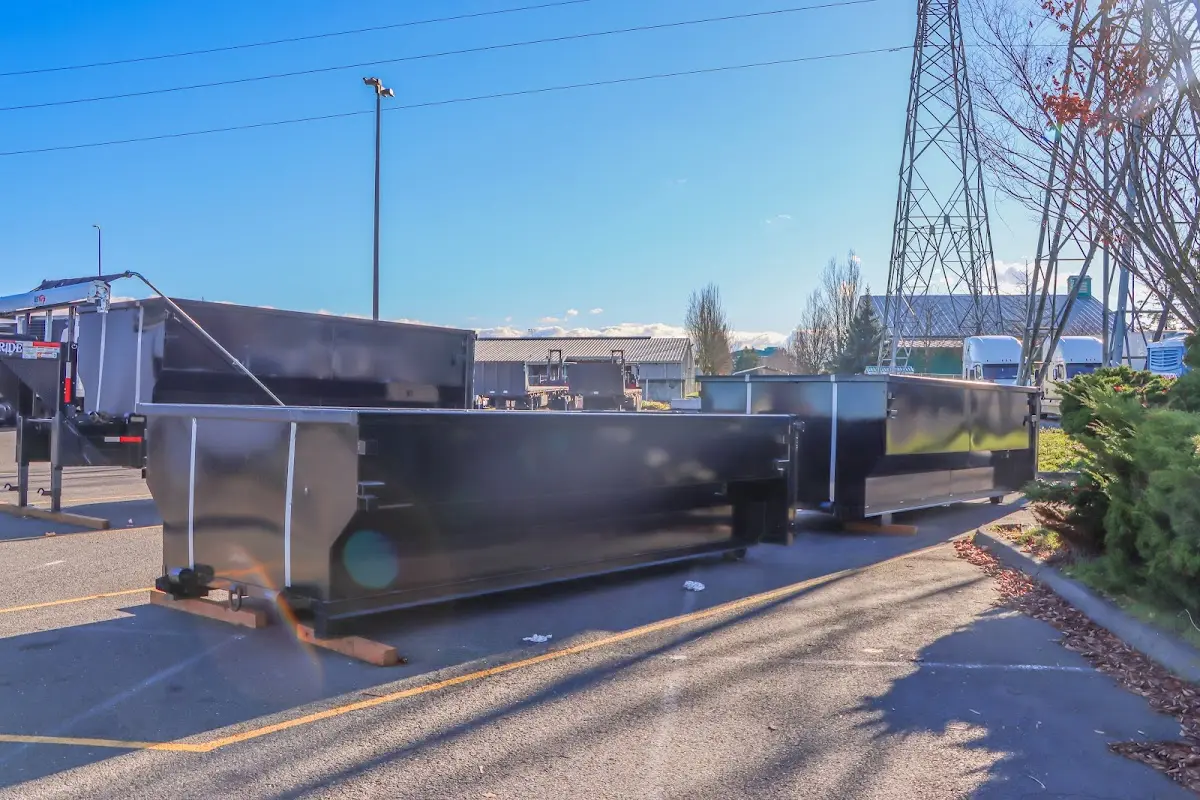 Roll-off dumpster ready for waste disposal at job site for Yard Waste Dumpster Rental in Southampton